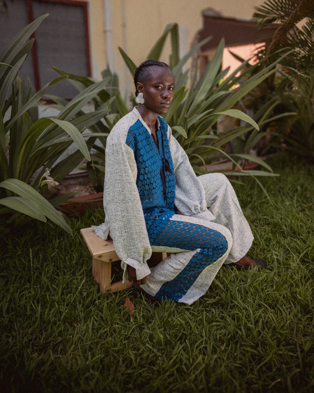 Ajabeng blue editorial look among green foliage