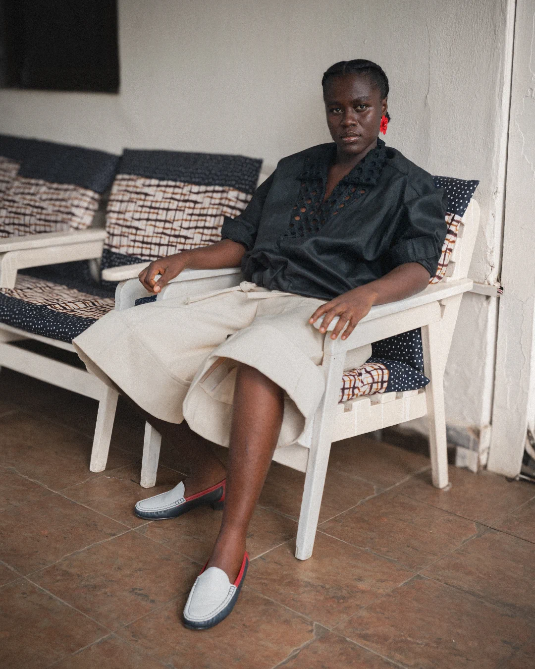 Ajabeng seated portrait